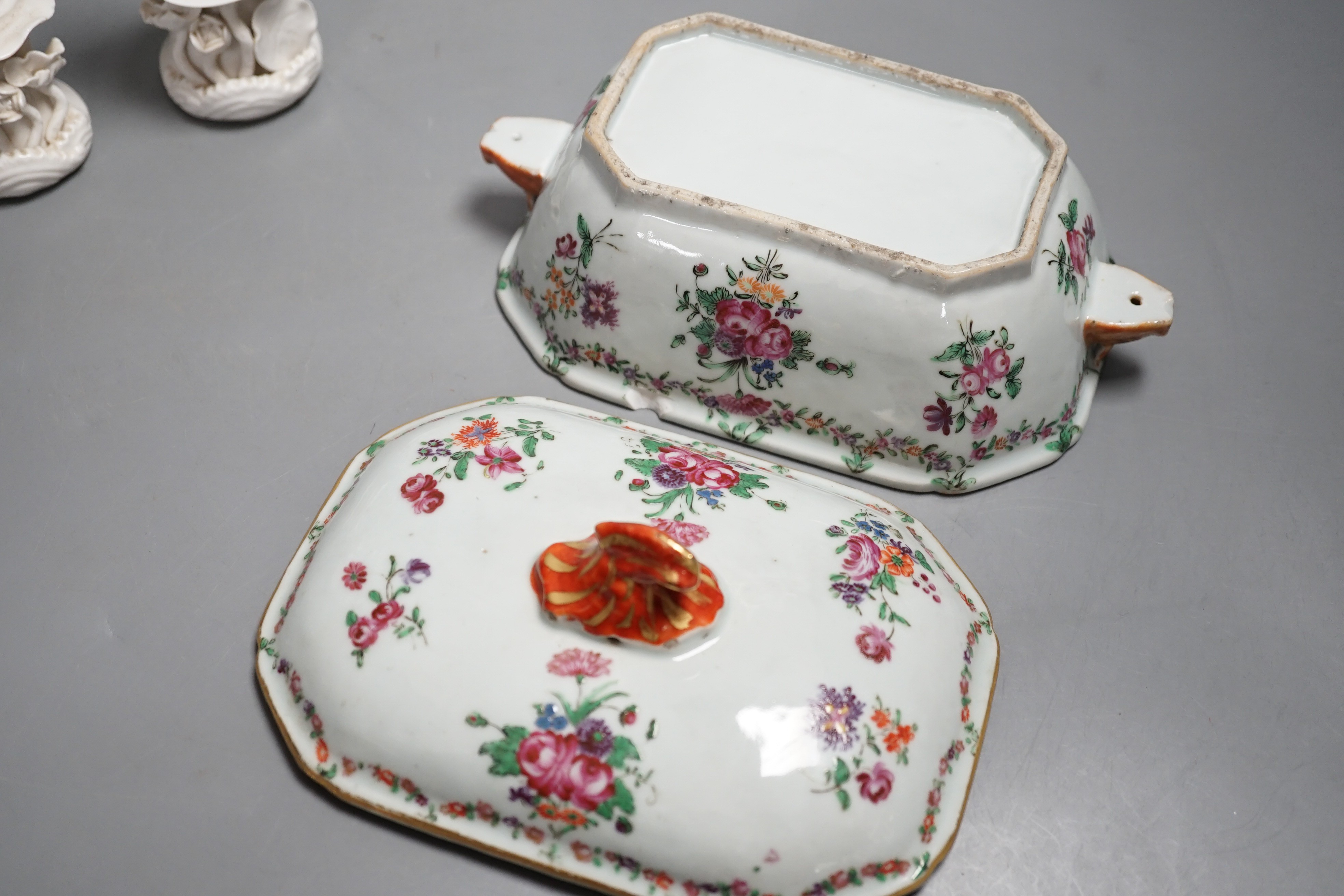 An 18th century Chinese lidded porcelain tureen and a pair of blanc de chine figures 18cm